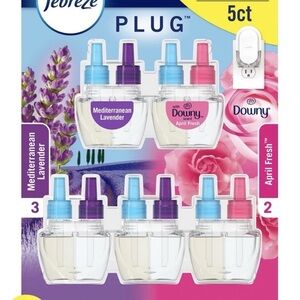 Febreze Plug Oil Refills with Purple and Pink Caps